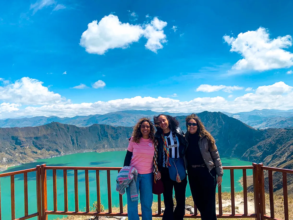 Hiking trail view of the Quilotoa crater lagoon during a day tour